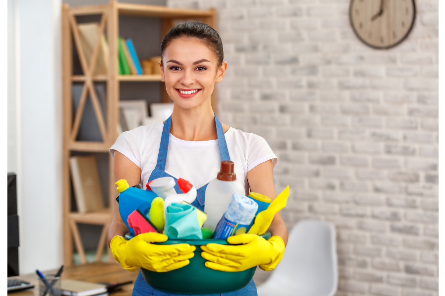 Girl and Cleaning Supplies